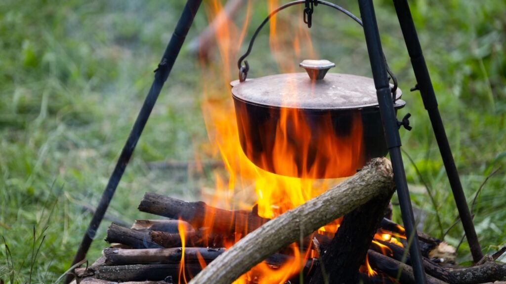 Dutch oven hanging on a tripod