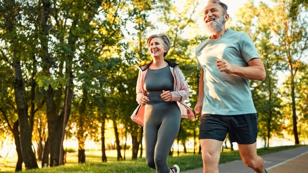 An elderly couple jogging