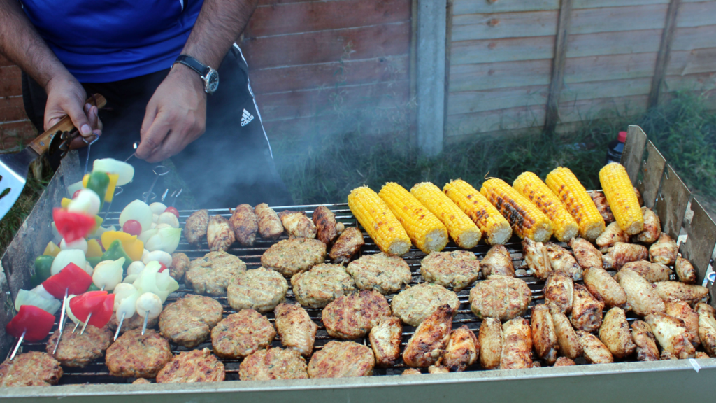 Cooking several food over open fire