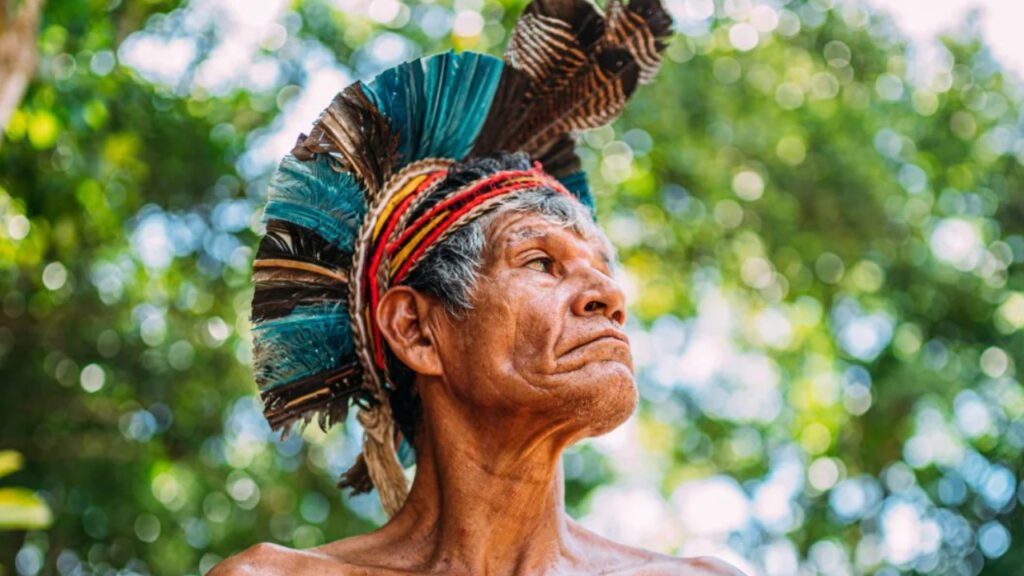 Indian,From,The,Pataxó,Tribe,,With,Feather,Headdress.,Elderly,Brazilian