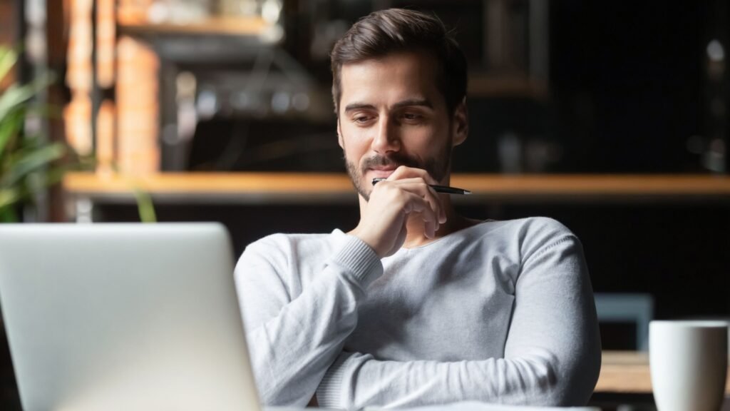 a man using a laptop
