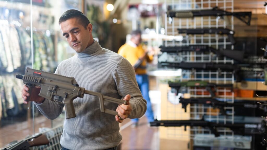 a man buying a semi-automatic assault rifle