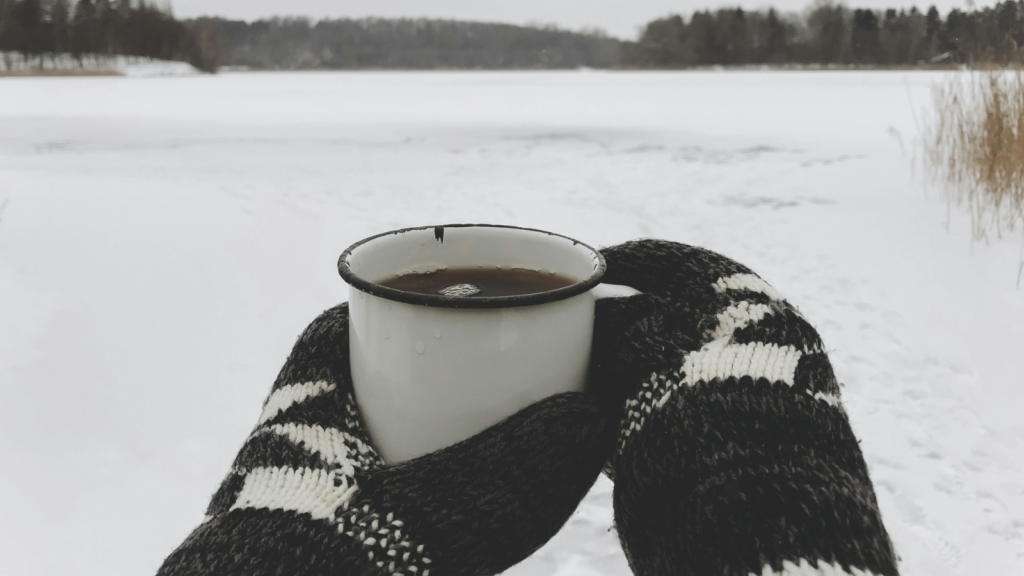 drinking a cup of coffee during winter
