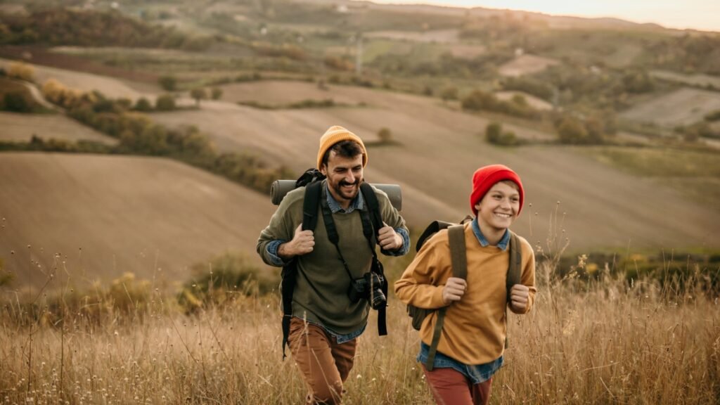 Father and son in the forest predicting weather