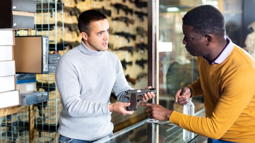 In store buying pistol for survival