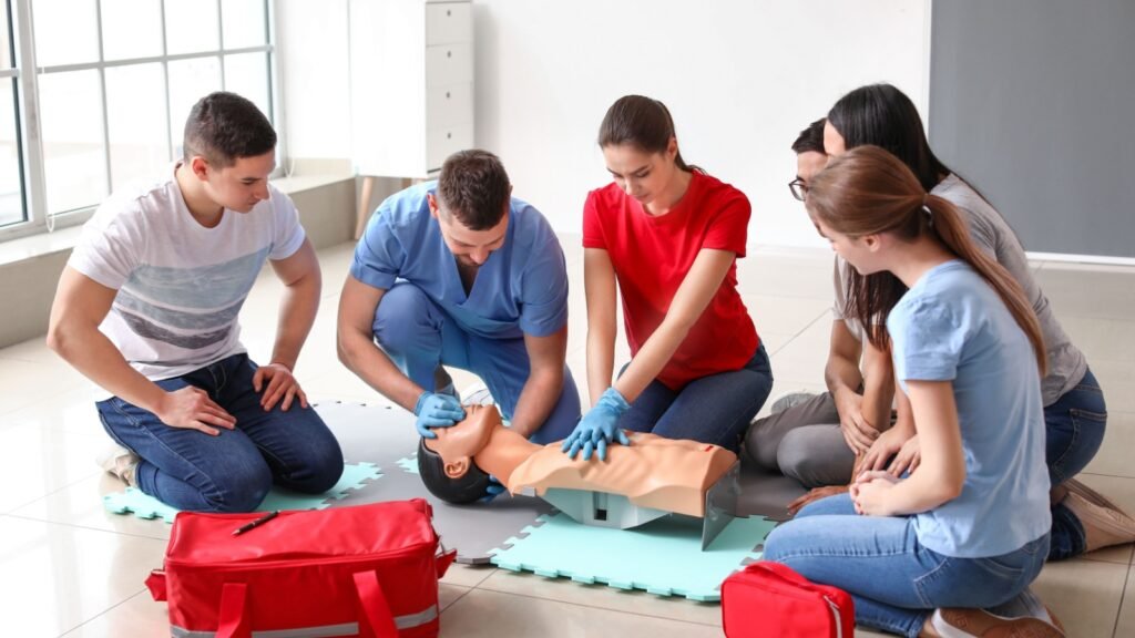 people learning CPR