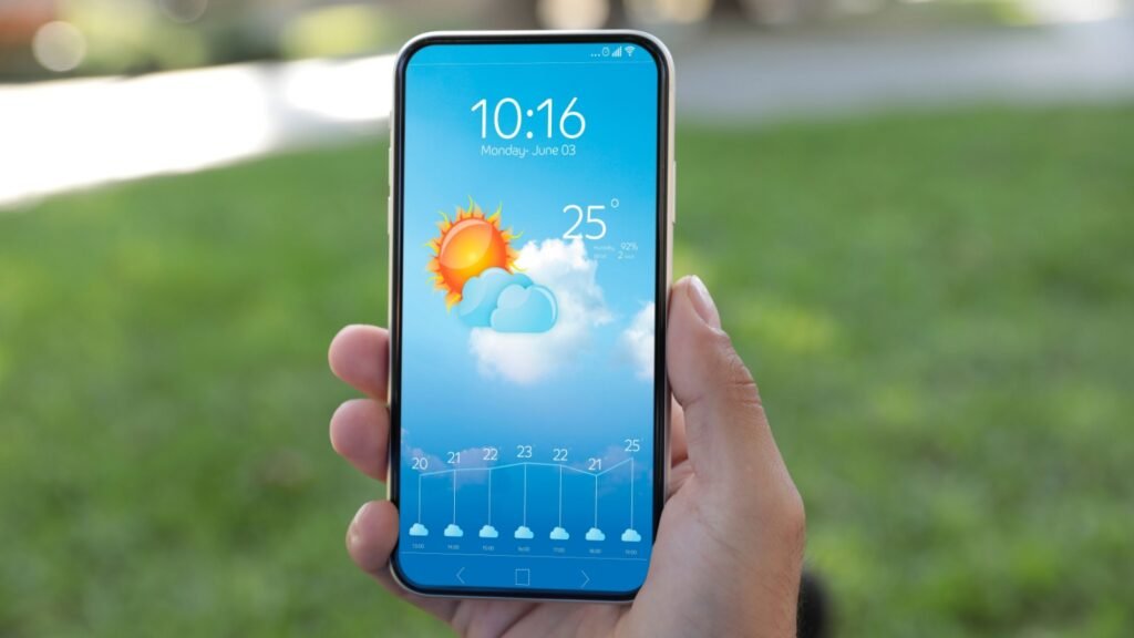 man looking phone weather app